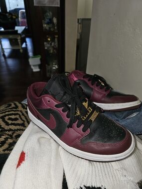 Nike Low-Top Sneakers in Black and Burgundy with Gold Accents